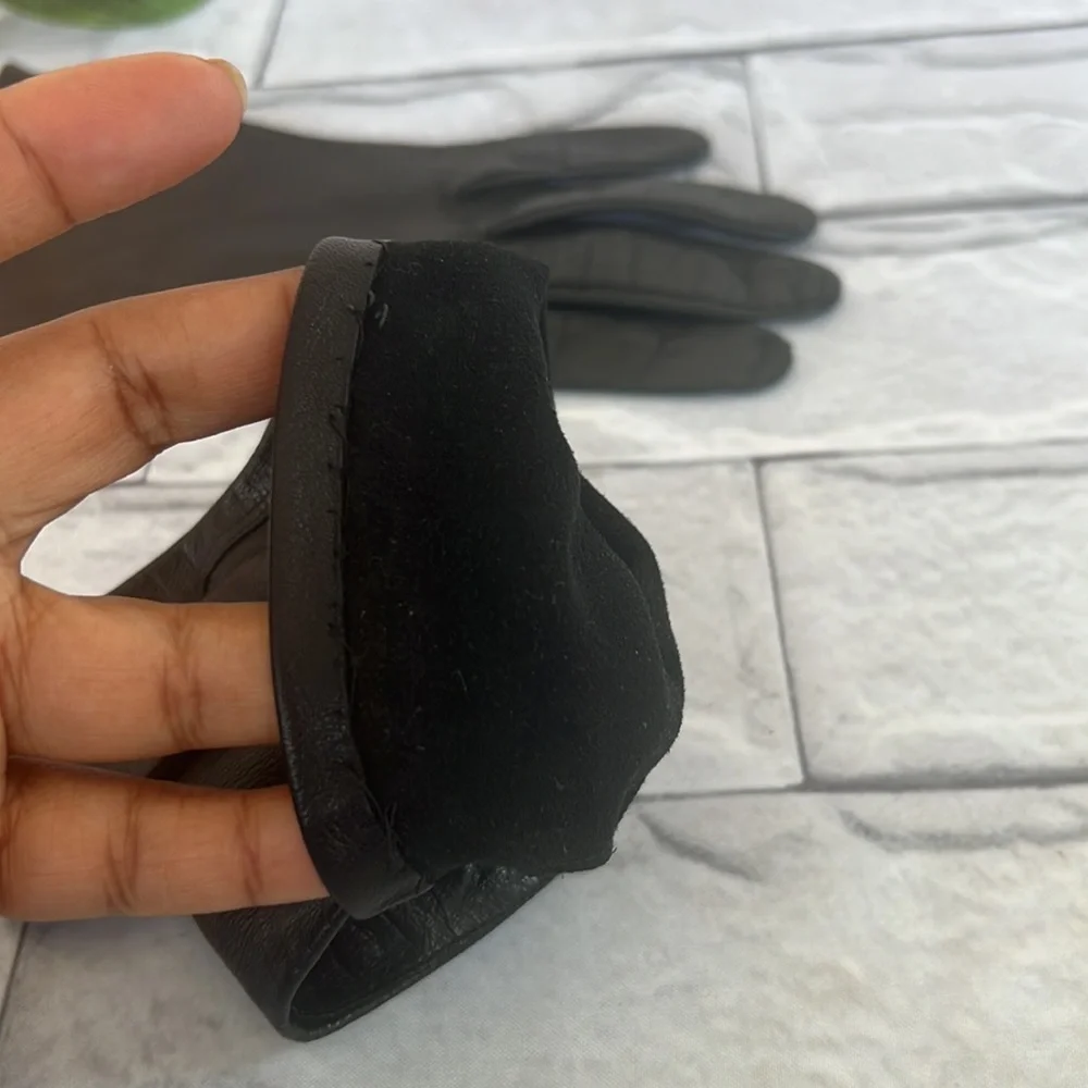 Black leather gloves